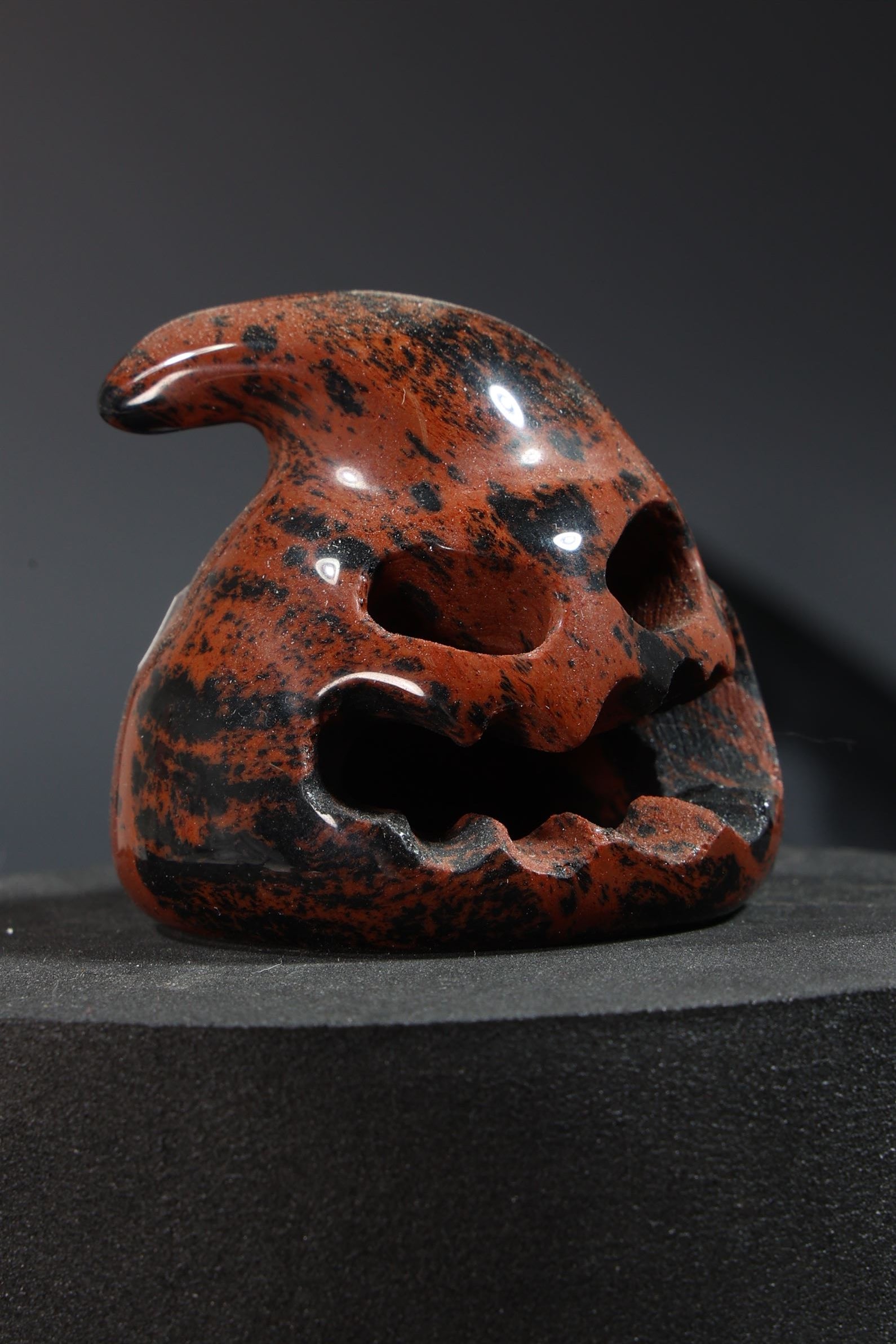 Hallow Mahogany Obsidian Oogie Boogie Skull Carving