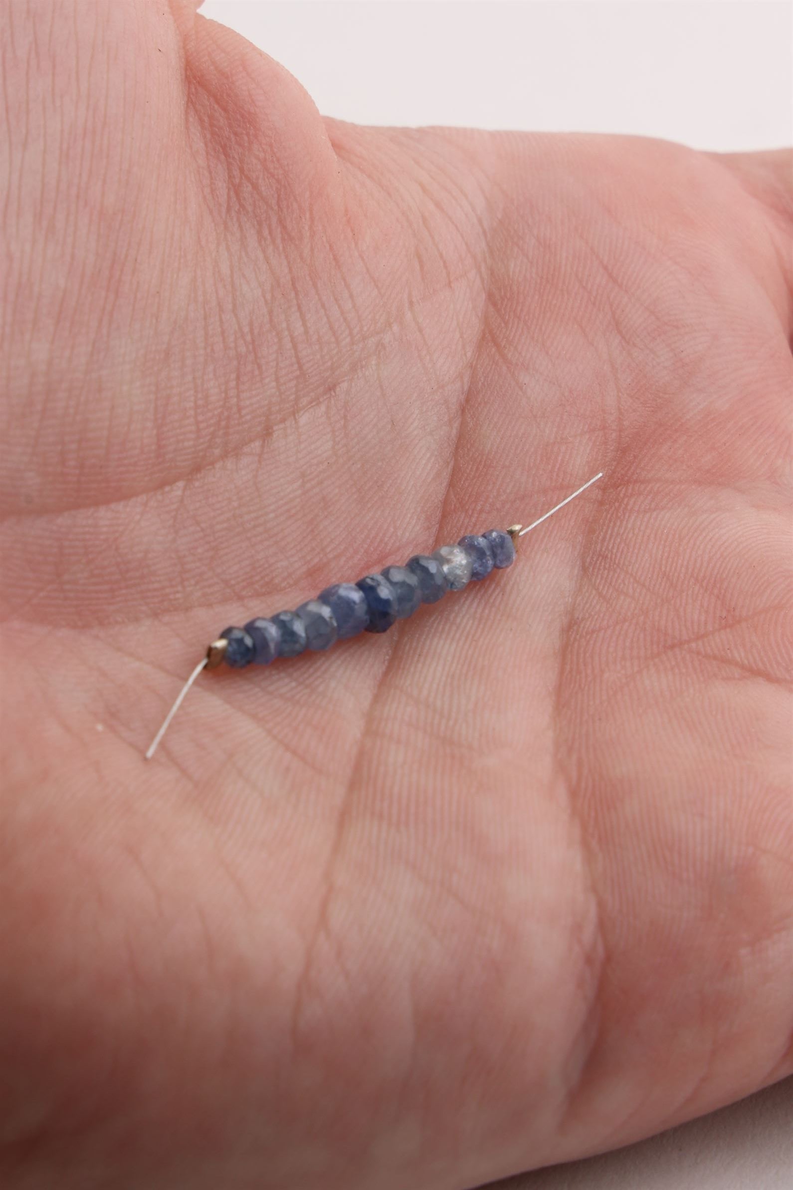 Small Faceted Blue Sapphire Bead Strand (11 Beads)