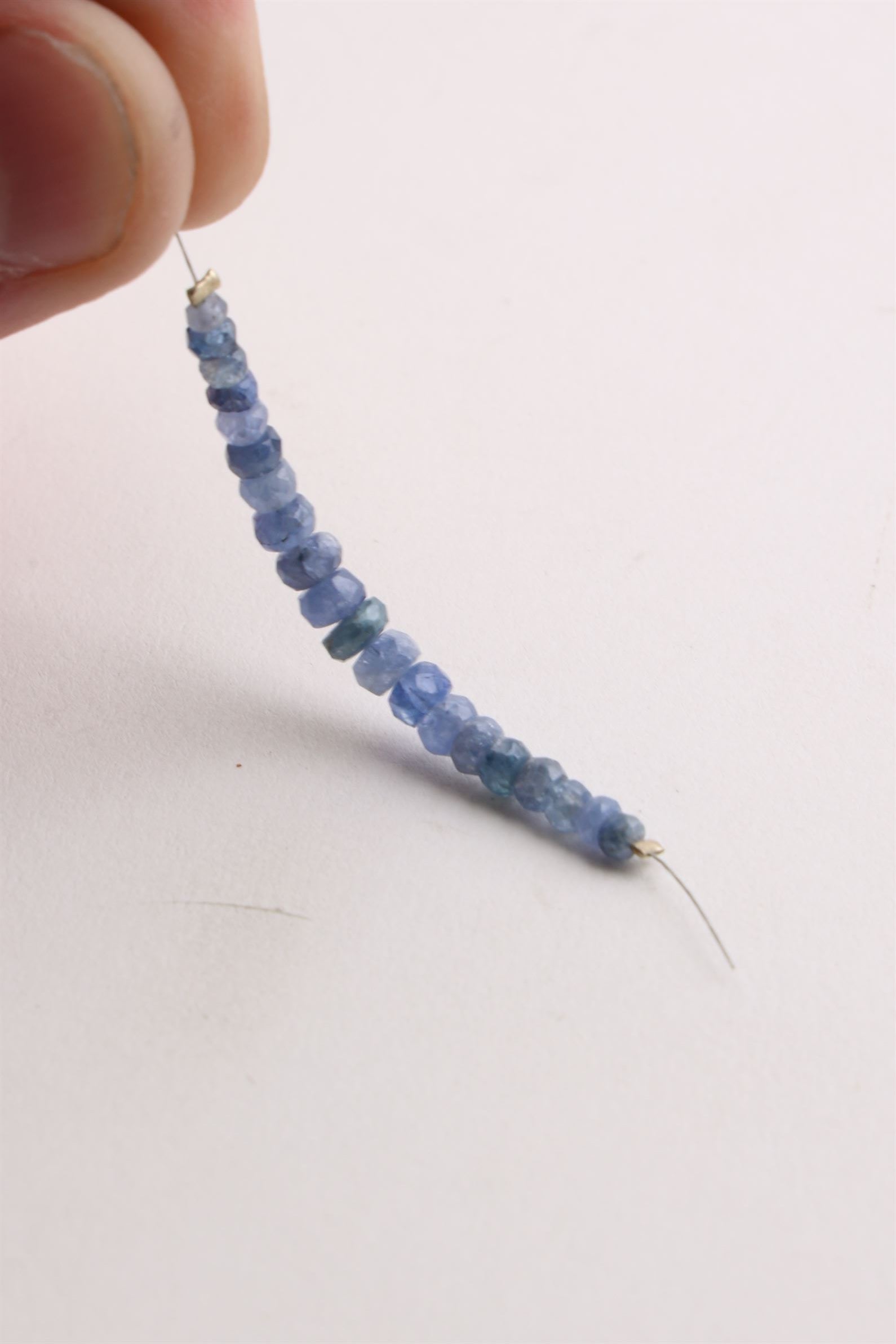 Small Faceted Blue Sapphire Bead Strand (21 Beads)